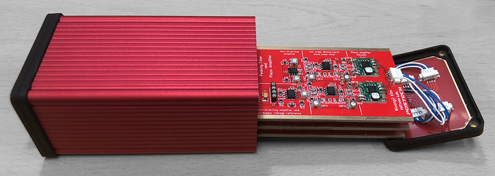 Three cascaded circuit boards inside housing for ACEL demonstration