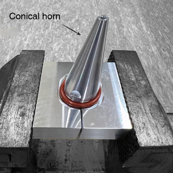 Coupling conical horn to Langevin transducer with controlled preload via torque wrench