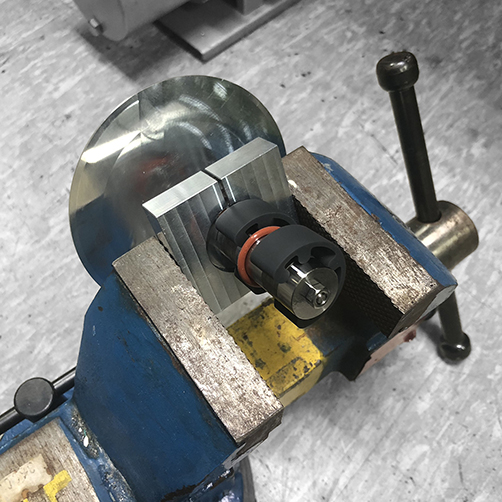 Transducer affixed with wrench flat clamping jig and mechanical vise